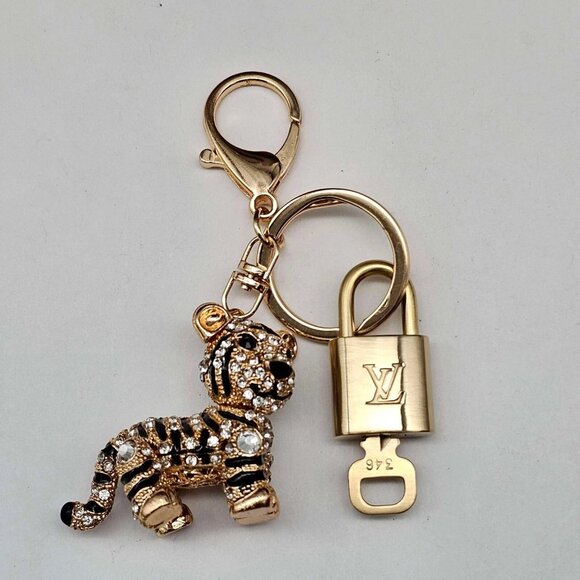 Authentic Louis Vuitton Lock & Key with unbranded Tiger Bagcharm, Keycharm - Picture 4 of 9